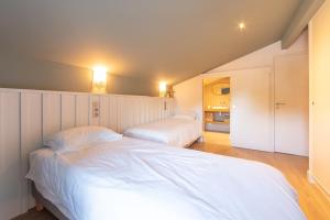 Postel nebo postele na pokoji v ubytování LE 144 FERRET cabane de 8 chambres, 8 sde & piscine