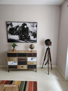 TV a/nebo společenská místnost v ubytování Le Mazet