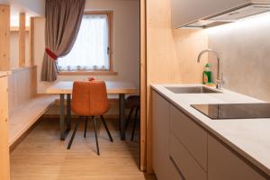 Eldhús eða eldhúskrókur á Chalet al Tabià +37 myndir