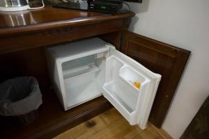 Kuchyň nebo kuchyňský kout v ubytování Rooms Base