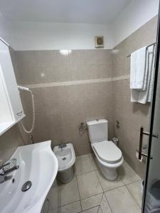Koupelna v ubytování Rooms Base