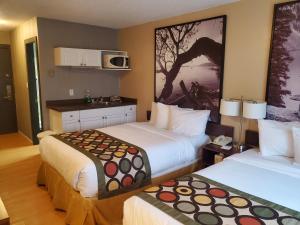 Letto o letti in una camera di Super 8 by Wyndham Duncan