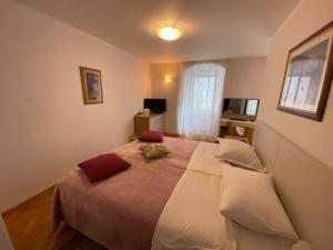 Postel nebo postele na pokoji v ubytování Rooms Base
