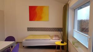 Katil atau katil-katil dalam bilik di Das Ferienhaus mit lichtem 85m² Studio