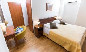 Postel nebo postele na pokoji v ubytování Rooms Base