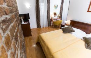 Postel nebo postele na pokoji v ubytování Rooms Base