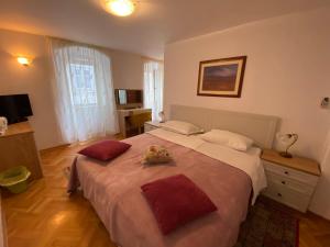 Postel nebo postele na pokoji v ubytování Rooms Base