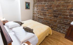 Postel nebo postele na pokoji v ubytování Rooms Base