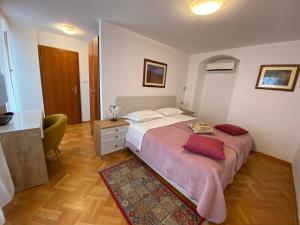 Postel nebo postele na pokoji v ubytování Rooms Base
