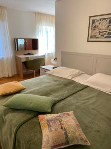 Postel nebo postele na pokoji v ubytování Rooms Base