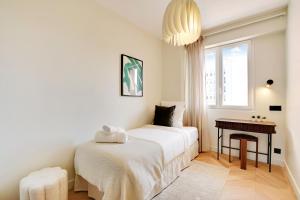 Voodi või voodid majutusasutuse Luxury Apartment by les Maisons de Charloc Homes toas
