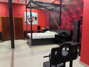 Postel nebo postele na pokoji v ubytování Motel Stilo - Adults Only
