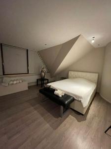 Ένα ή περισσότερα κρεβάτια σε δωμάτιο στο Luxury Villa Stay