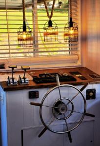 a kitchen with a counter with a bird cage on it at Long Cove Resort and Marina in Charlotte