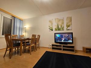 TV a/nebo společenská místnost v ubytování Apartmán Pod Lesem - Krkonoše