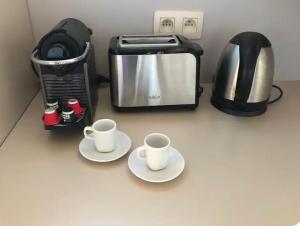 Kaffi- og teaðstaða á Duplex avec superbe vue boisée