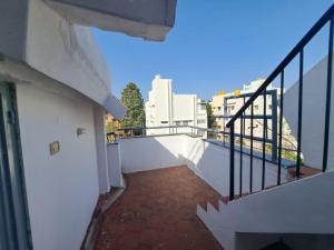 a view of a balcony of a building at 3 Bedroom Duplex Villa With Private Pool Bangalore in Bangalore