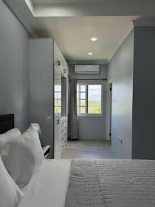Tempat tidur dalam kamar di Ridge View