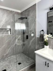 a bathroom with a shower and a sink at Ridge View in Kingstown