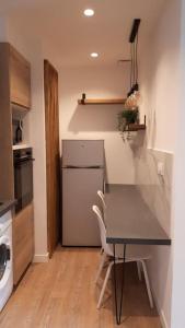Kuchyň nebo kuchyňský kout v ubytování Porticcio- Duplex dans propriété privée