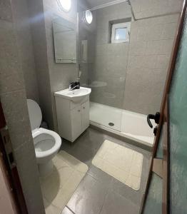 Koupelna v ubytování Enjoy Apartment Barlad