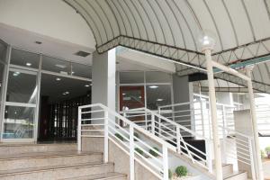 a building with a staircase in front of a building at Days inn by Wyndham Uberlândia in Uberlândia