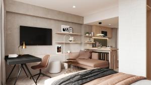 1 dormitorio con 1 cama y escritorio con TV en Residence Inn by Marriott Geneva City Nations en Ginebra