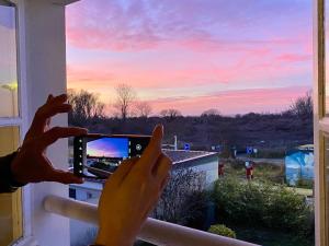 Blick auf den Sonnenuntergang/Sonnenaufgang von der Ferienwohnung aus oder aus der Nähe