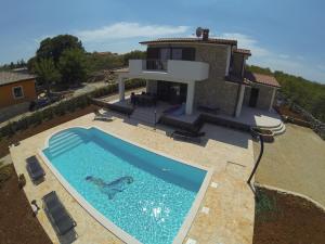 View ng pool sa Villa Calypso o sa malapit