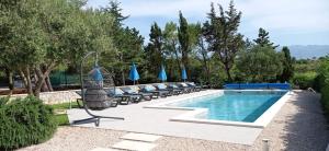 Bazén v ubytování Apartment in Casa Porta Luna, Gajac, Novalja nebo v jeho okolí