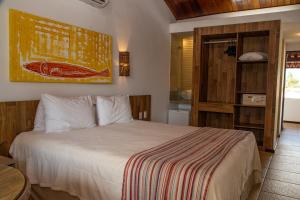 a bedroom with a bed in a room at Serrambi Resort in Porto De Galinhas