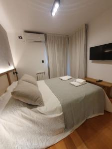 Voodi või voodid majutusasutuse LOAN Nueva Cordoba categoría appart 11B toas +9 fotot