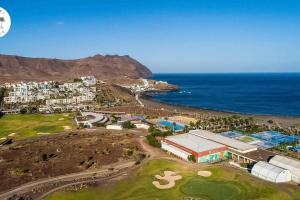 an aerial view of a resort near the ocean at Las Playitas Sport&Golf in Las Playas
