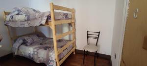 Letto o letti in una camera di Scorpius Hostel