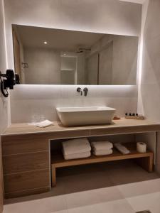 Koupelna v ubytování Likoria Hotel + 37 fotografií