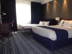Rúm í herbergi á Holiday Inn Express Strasbourg - Sud by IHG
