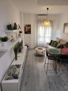 Posedenie v ubytovaní Acogedor apartamento cerca del centro histórico de Málaga