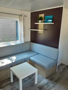 Posezení v ubytování Riva Bella chez Caraphou