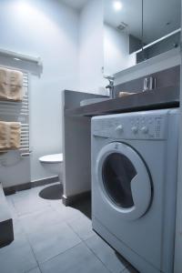 Kuchyň nebo kuchyňský kout v ubytování Appartement Marais Cœur Historique