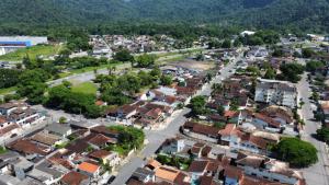 an aerial view of a town in a city at Suítes Margarida in Ubatuba