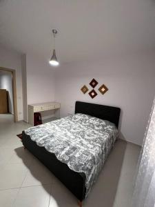 Ένα ή περισσότερα κρεβάτια σε δωμάτιο στο Asli's Comfy Studio APT