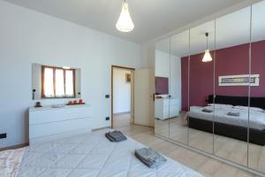 Katil atau katil-katil dalam bilik di Accogliente casa a Pontassieve