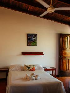Postel nebo postele na pokoji v ubytování Hotel Hibiscus
