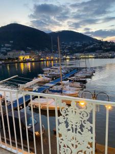 a group of boats docked in a harbor at Riva Destra Suite apartament in Ischia