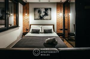 Ένα ή περισσότερα κρεβάτια σε δωμάτιο στο Happy Night - ApartamentyHappy pl +34 φωτογραφίες