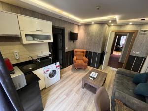 Kuchyň nebo kuchyňský kout v ubytování Dolce Vita Suite Hotel