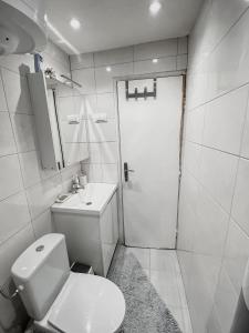 Koupelna v ubytování Apartman Simon + 23 fotografií