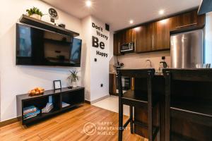 Kuchyňa alebo kuchynka v ubytovaní Happy Day - ApartamentyHappy pl