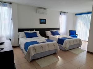 Postel nebo postele na pokoji v ubytování Hotel Yurak