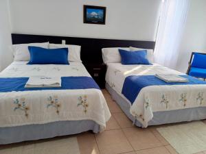 Postel nebo postele na pokoji v ubytování Hotel Yurak